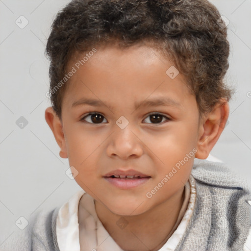 Joyful white child male with short  brown hair and brown eyes