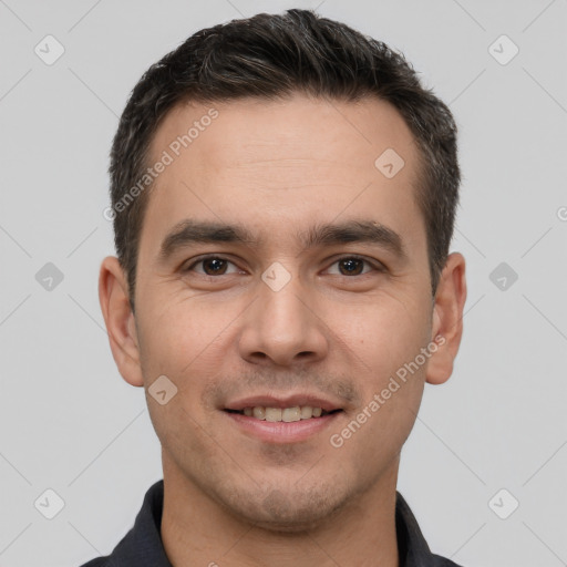 Joyful white young-adult male with short  brown hair and brown eyes