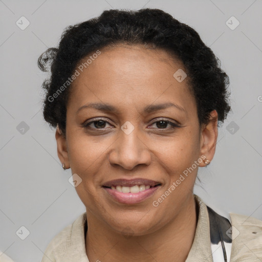 Joyful latino adult female with short  brown hair and brown eyes