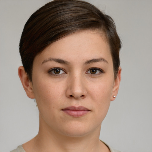 Neutral white young-adult female with short  brown hair and grey eyes