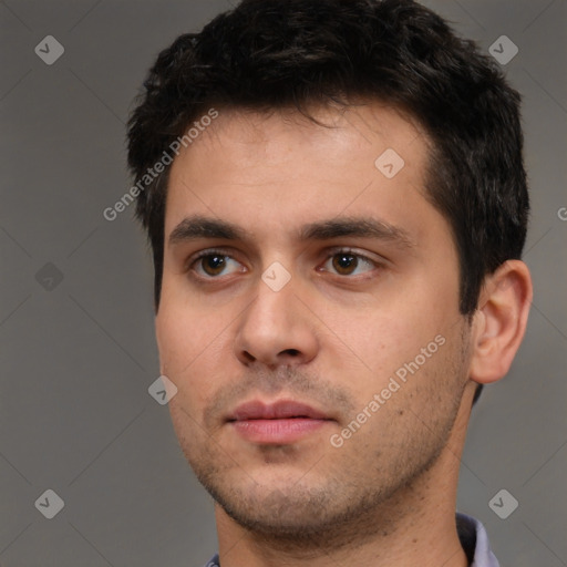 Neutral white young-adult male with short  black hair and brown eyes