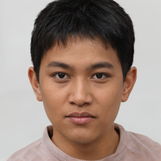 Neutral asian young-adult male with short  brown hair and brown eyes