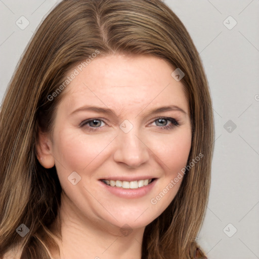 Joyful white young-adult female with long  brown hair and grey eyes