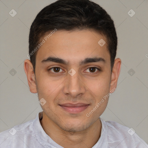 Joyful latino young-adult male with short  brown hair and brown eyes