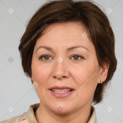 Joyful white adult female with medium  brown hair and brown eyes