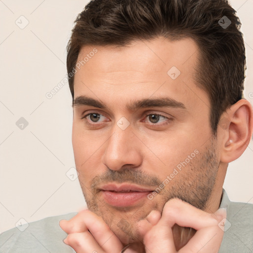 Neutral white adult male with short  brown hair and brown eyes