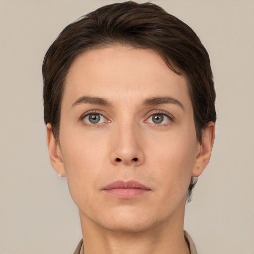 Neutral white young-adult female with short  brown hair and grey eyes