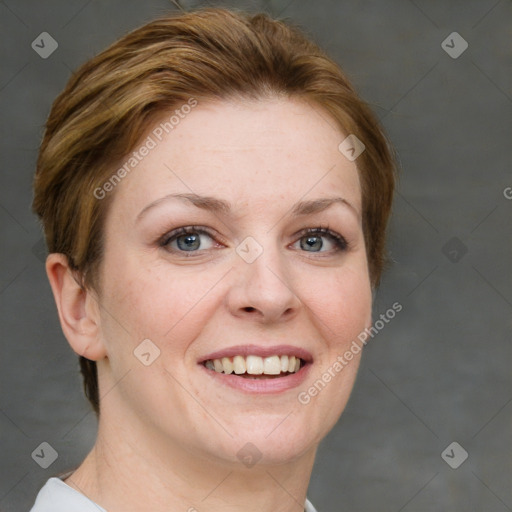 Joyful white adult female with short  brown hair and grey eyes