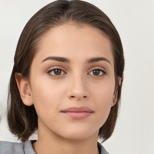 Neutral white young-adult female with medium  brown hair and brown eyes