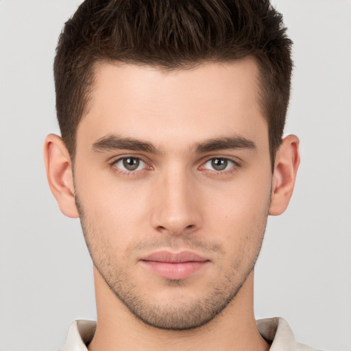 Neutral white young-adult male with short  brown hair and brown eyes