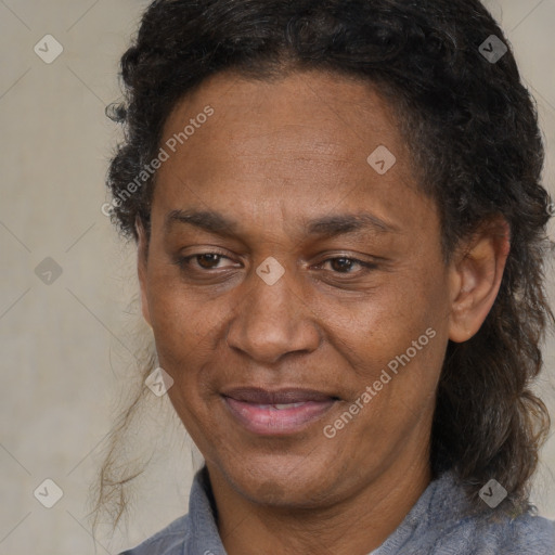 Joyful black adult female with medium  brown hair and brown eyes