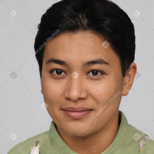 Joyful asian young-adult male with short  black hair and brown eyes