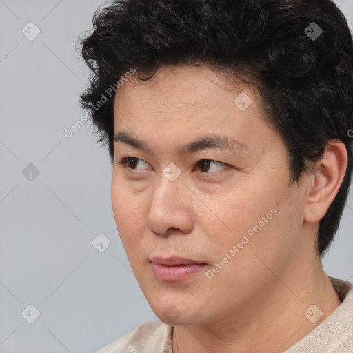 Neutral asian young-adult male with short  brown hair and brown eyes