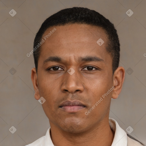 Neutral latino young-adult male with short  black hair and brown eyes