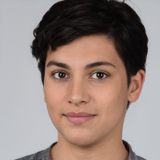 Joyful white young-adult female with short  black hair and brown eyes