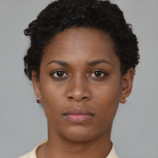 Neutral black young-adult female with short  brown hair and brown eyes