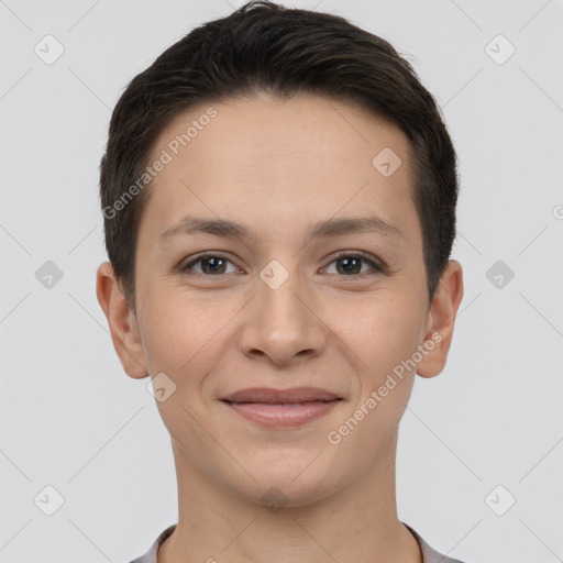 Joyful white young-adult female with short  brown hair and brown eyes