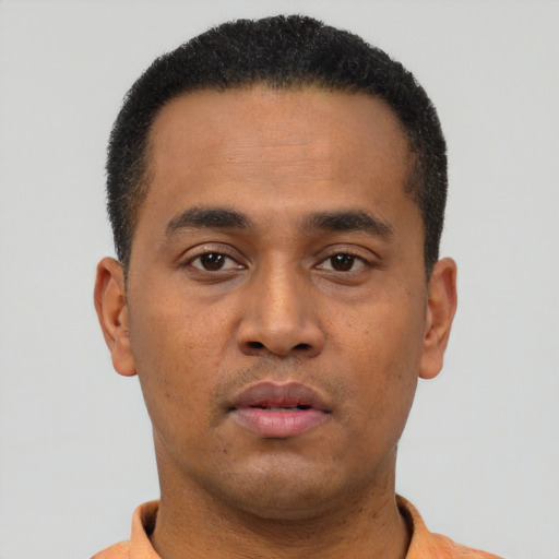 Neutral latino young-adult male with short  brown hair and brown eyes