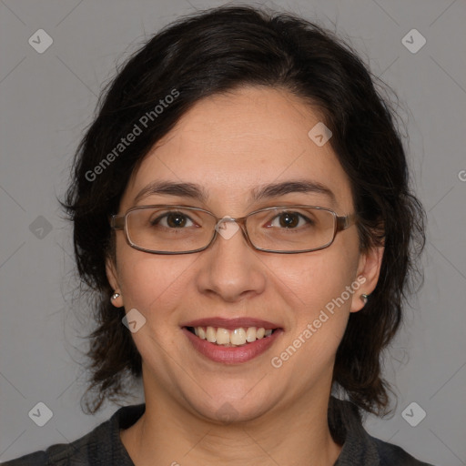 Joyful white adult female with medium  brown hair and brown eyes