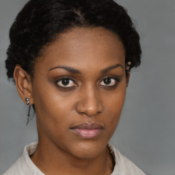 Neutral black young-adult female with short  brown hair and brown eyes