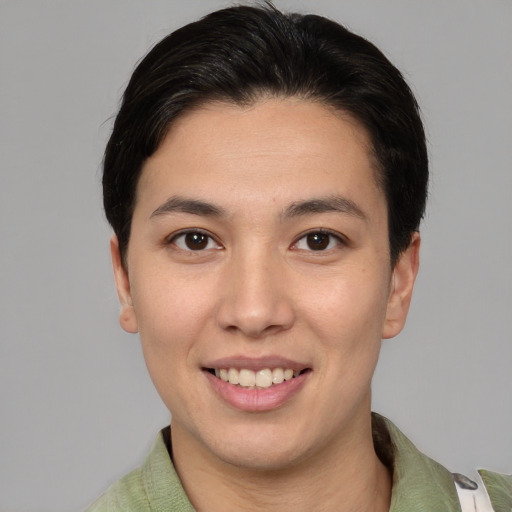 Joyful white young-adult female with short  brown hair and brown eyes