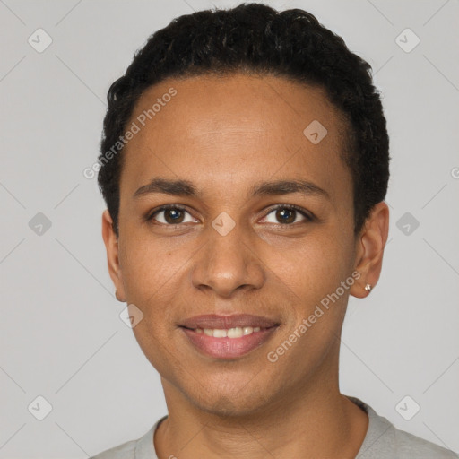 Joyful black young-adult male with short  brown hair and brown eyes