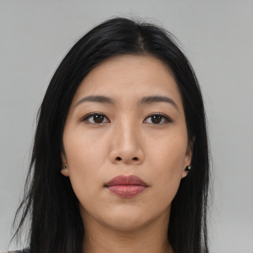 Neutral asian young-adult female with long  black hair and brown eyes