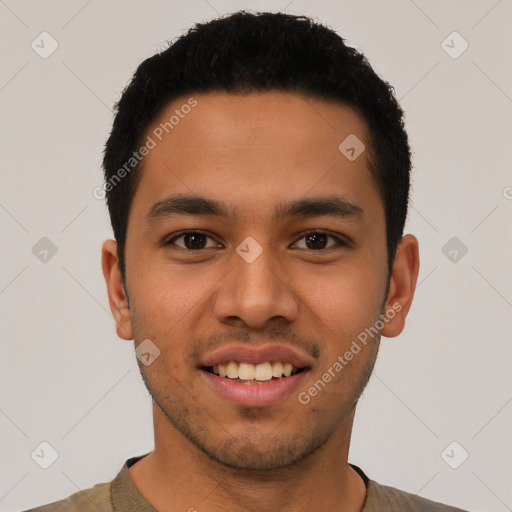 Joyful latino young-adult male with short  black hair and brown eyes