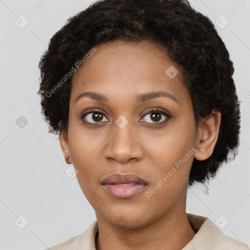 Neutral black young-adult female with short  brown hair and brown eyes