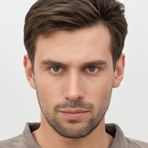 Neutral white young-adult male with short  brown hair and brown eyes