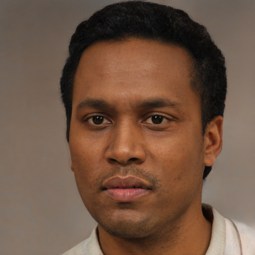 Neutral black young-adult male with short  black hair and brown eyes