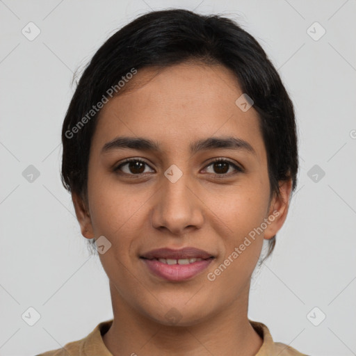 Joyful latino young-adult female with short  brown hair and brown eyes