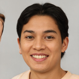 Joyful asian young-adult female with short  brown hair and brown eyes