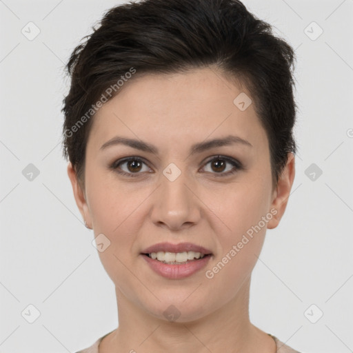 Joyful white young-adult female with short  brown hair and brown eyes