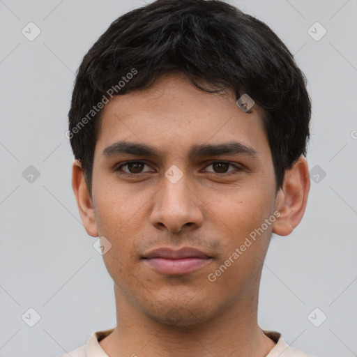 Neutral white young-adult male with short  brown hair and brown eyes