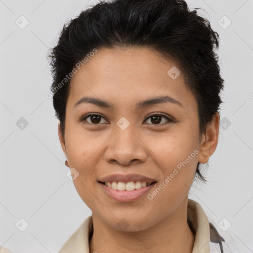 Joyful asian young-adult female with short  brown hair and brown eyes