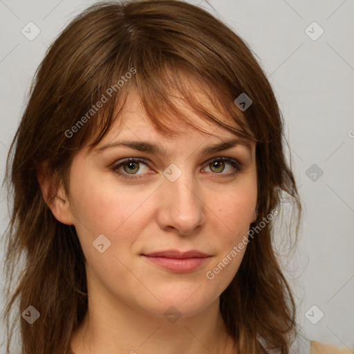 Joyful white young-adult female with medium  brown hair and blue eyes