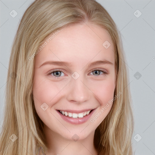 Joyful white young-adult female with long  brown hair and blue eyes