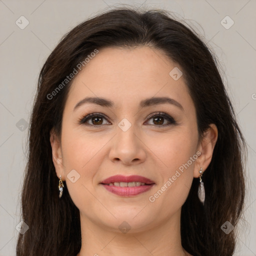 Joyful white young-adult female with long  brown hair and brown eyes