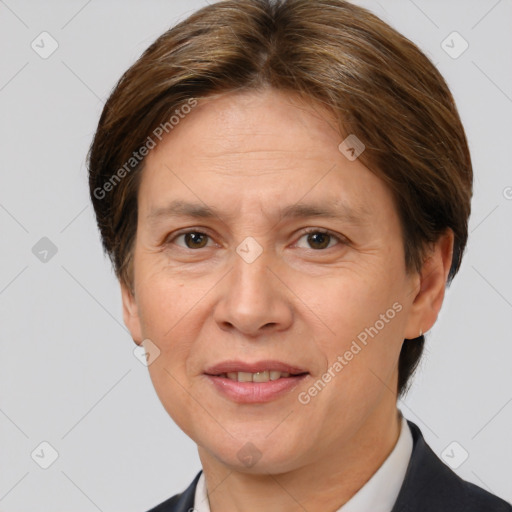 Joyful white adult female with short  brown hair and brown eyes