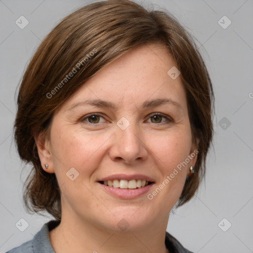 Joyful white adult female with medium  brown hair and grey eyes