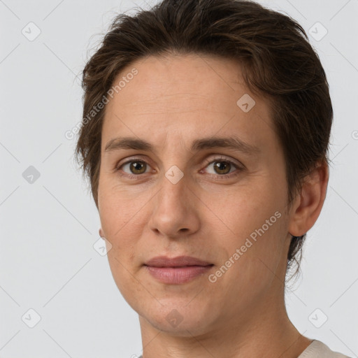 Joyful white adult female with short  brown hair and brown eyes