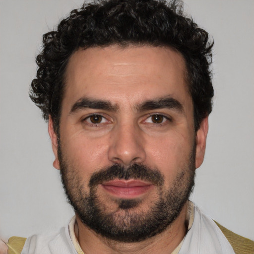 Neutral white young-adult male with short  black hair and brown eyes