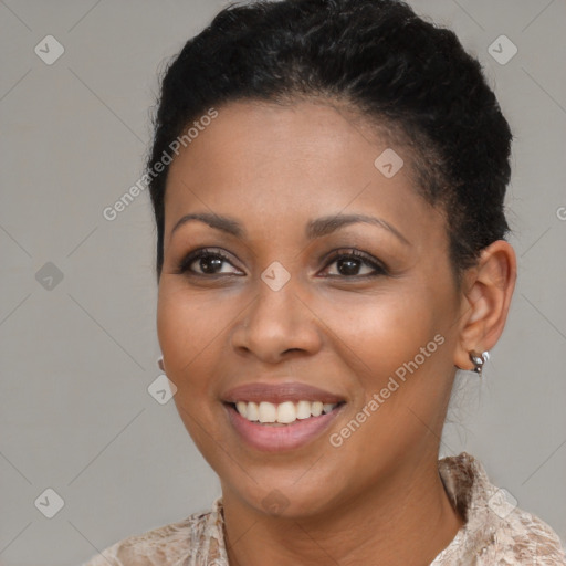 Joyful black young-adult female with medium  brown hair and brown eyes