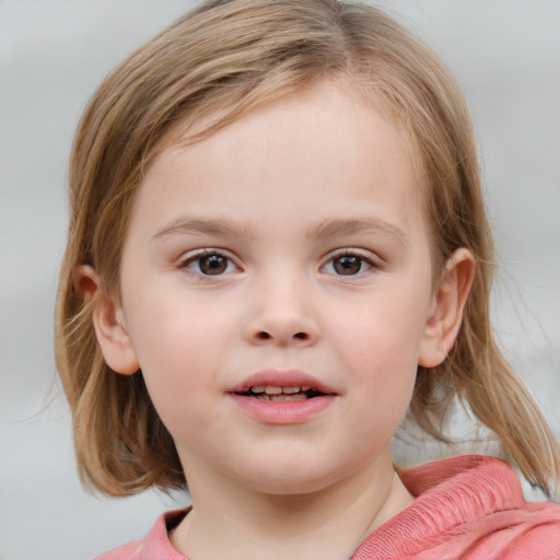 Joyful white child female with medium  brown hair and blue eyes