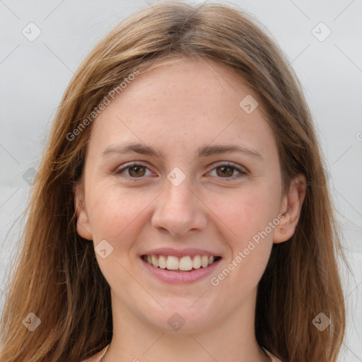 Joyful white young-adult female with long  brown hair and grey eyes