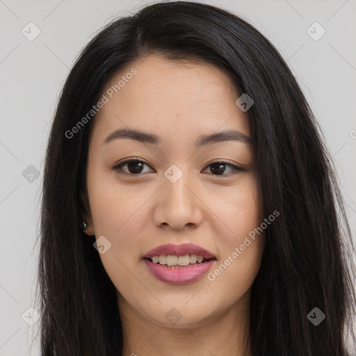 Joyful asian young-adult female with long  brown hair and brown eyes