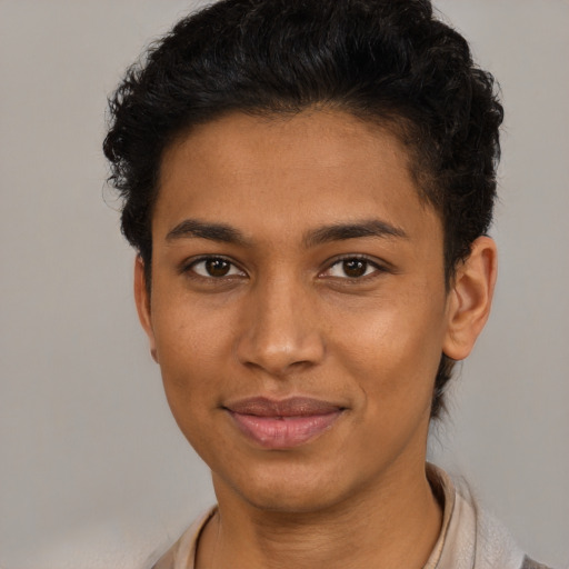 Joyful latino young-adult female with short  brown hair and brown eyes