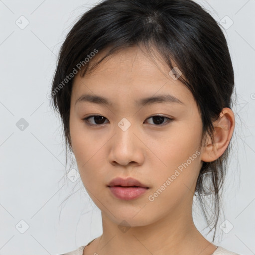 Neutral asian young-adult female with medium  brown hair and brown eyes