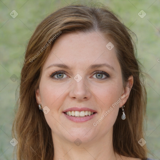 Joyful white young-adult female with medium  brown hair and green eyes